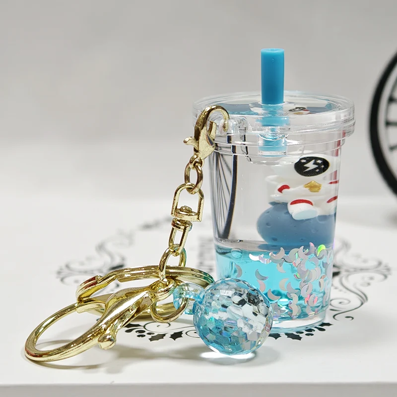 Porte-clés tasse de thé au lait liquide