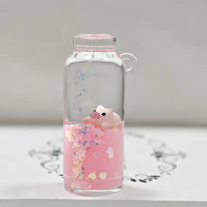 Porte-clés liquide bouteille de lait